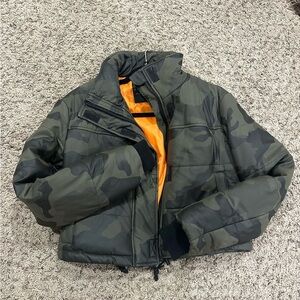 Bagatelle Camouflage Jacket with Vibrant Orange Lining